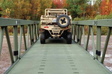 Military Jeep crossing a light vehicle aluminum extruded bridge